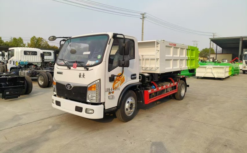 重汽豪曼藍(lán)牌勾臂垃圾車(chē)