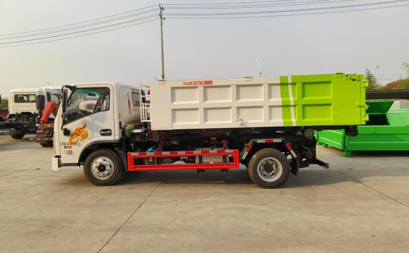 重汽豪曼藍(lán)牌勾臂垃圾車(chē)